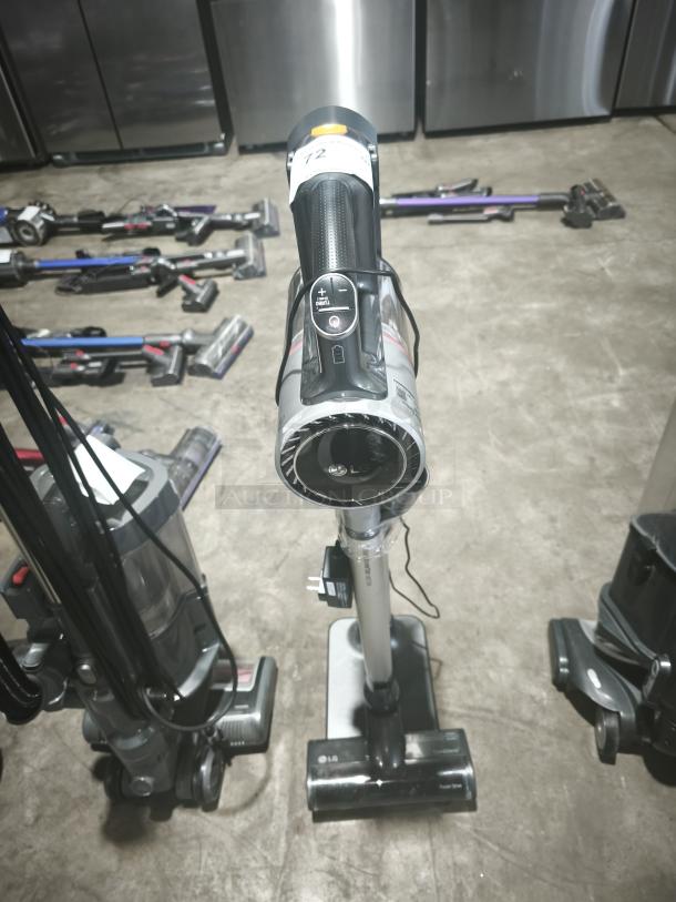 LG CordZero A9 cordless stick vacuum, model A916BM. Tested, working condition, with display controls and LG branding.