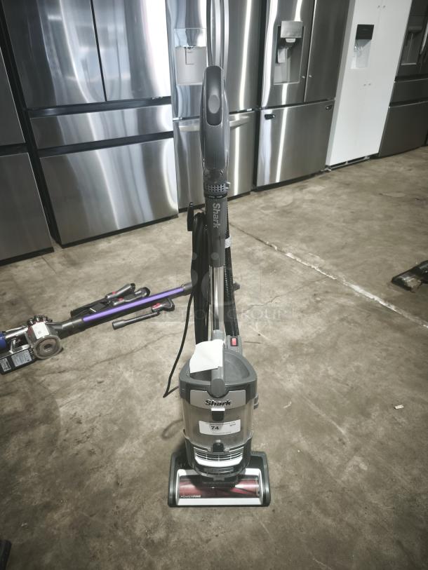 Shark UV730 Navigator Lift-Away upright vacuum, tested and working, gray color, visible suction head, clean condition.