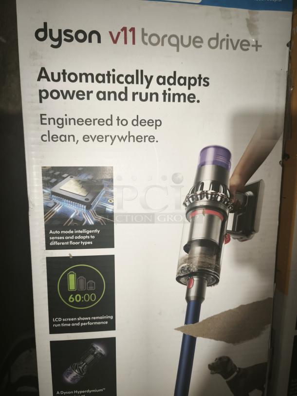 Dyson V11 Torque Drive PLUS box, highlights auto mode, 60-minute runtime, LCD screen, powerful suction, new condition.