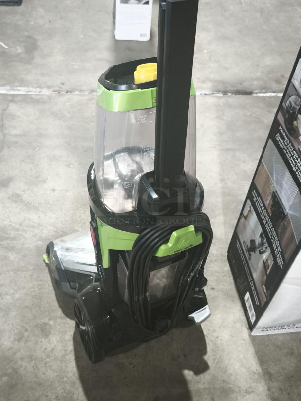 BISSELL ProHeat 2X Revolution Carpet Cleaner, Model 1548, pet-specific, tested, black and green, coiled cord, excellent condition.