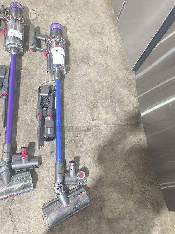 Dyson V11 Torque Drive PLUS cordless stick vacuum, tested and working, in good condition. Visible tag labeled "116".