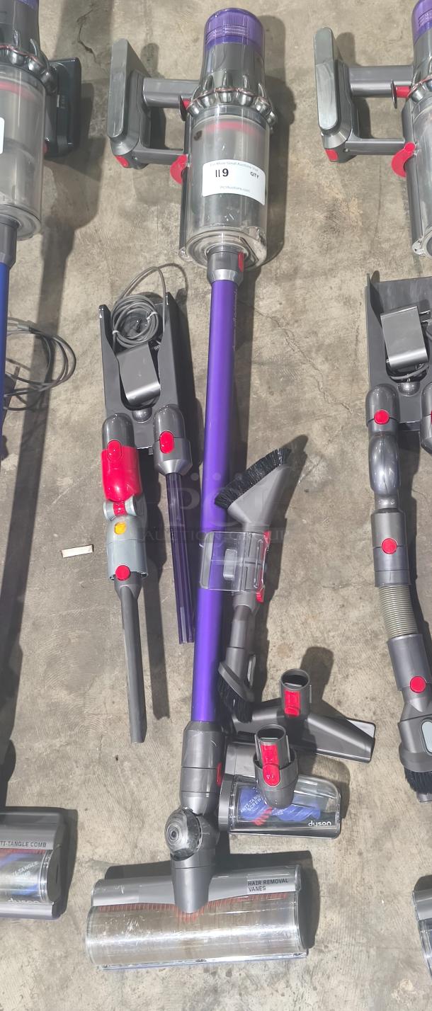 Dyson V11 Torque Drive PLUS cordless vacuum, tested and working, with accessories, model label visible, excellent condition.