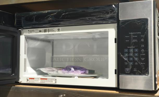 BRAND NEW GE 1.6 cu ft Over-the-Range Microwave Oven, Model PVM9005SJ8SS. Scratch and dent condition. Black and stainless steel finish.