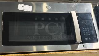 BRAND NEW SCRATCH AND DENT -GE 1.6 cu ft Over-the-Range Microwave Oven - Item #1214785