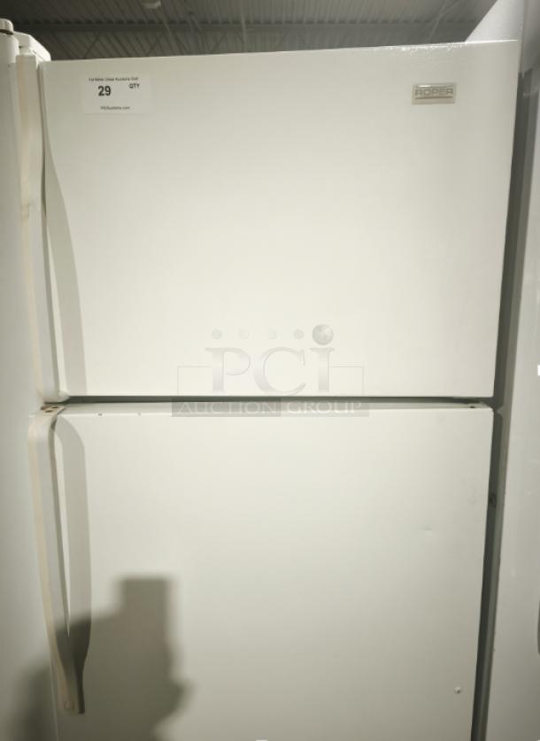 Roper RT18BKXKQ00 refrigerator/freezer, white, top freezer design, visible condition issues, auction tag marked "29".