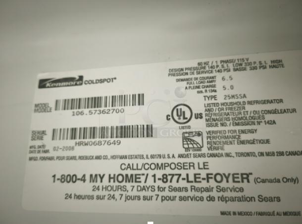 Label of Kenmore Coldspot refrigerator, model 10657362700, showing model and serial numbers, energy rating, and contact info.