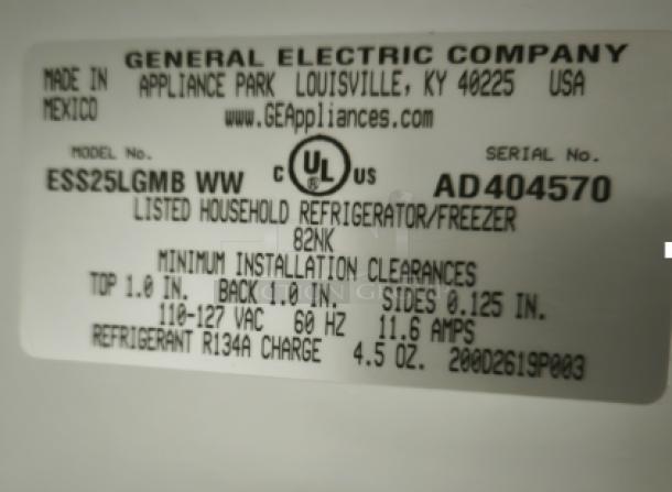 Label on GE Eterna-series refrigerator, model ESS25LGMBB WW. Lists installation clearances and electrical specs.