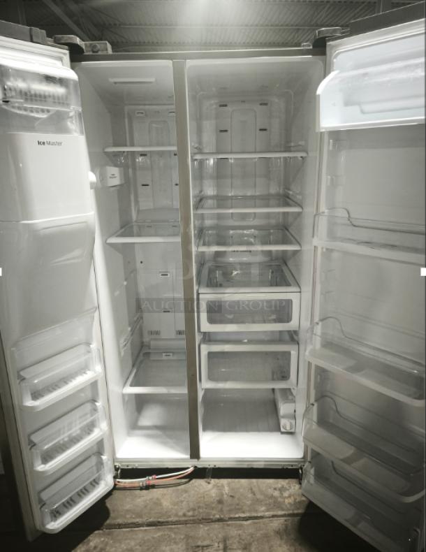 Samsung 24.5 Cu. Ft. Side-by-Side Refrigerator RS25H5111SR, open doors, in-door ice maker, clean interior, shelves visible.