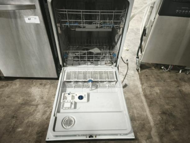 Whirlpool Gold 24" Built-In Dishwasher, model WDT720PADM2, open with visible racks and control panel, excellent condition.