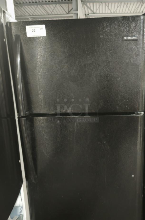 Frigidaire FFTR1821TB 18 Cu. ft. black top freezer refrigerator in fair condition, model FFTR1821TB0.