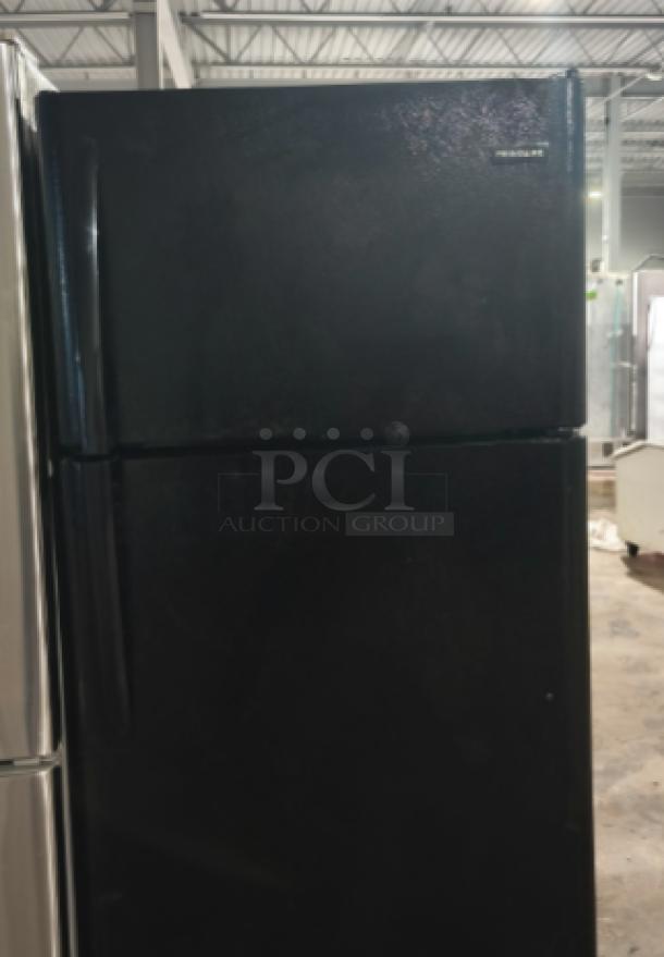 Frigidaire FFTR1821TB 18 Cu. ft. black top freezer refrigerator, model FFTR1821TB0, in good condition.