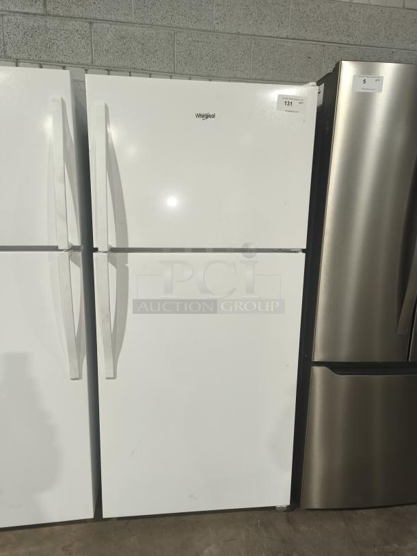 Whirlpool 30-inch wide top-freezer refrigerator, model WRT318FZDW, 18 cu ft, working condition, white finish.