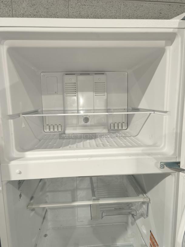 Whirlpool 30-inch top-freezer refrigerator, model WRT318FZDW, 18 cu ft, tested and working, clean condition, open doors view.
