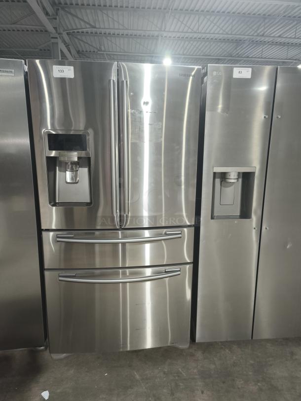 Samsung 28 cu ft 4-Door French Door Refrigerator, Model RF4287HARS, stainless steel, with FlexZone Drawer and water dispenser.