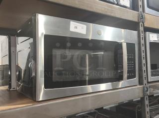 BRAND NEW SCRATCH AND DENT -GE 1.6 cu ft Over-the-Range Microwave Oven - Item #1214782
