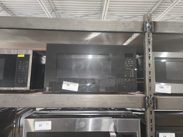 BRAND NEW GE Profile 2.2 cu ft Built-In Sensor Microwave Oven, model PCWK22U1WDD, minor scratches, shelf display.