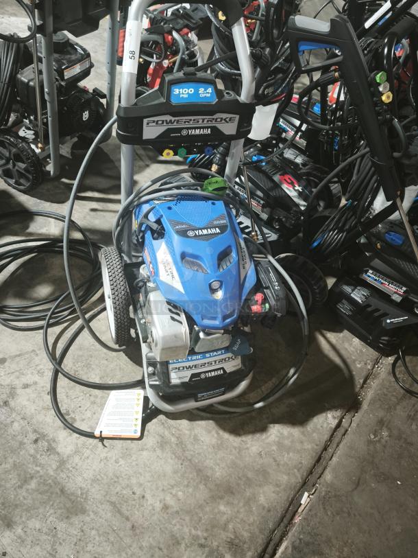 AR Blue Clean XP3-2400 Electric Pressure Washer, tested and working, features durable construction, visible labels, cords intact.