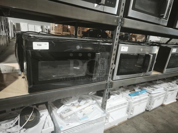 BRAND NEW GE JVM3160DFBB 1.6 cu ft Over-the-Range Microwave Oven, scratch and dent condition, with visible control panel.