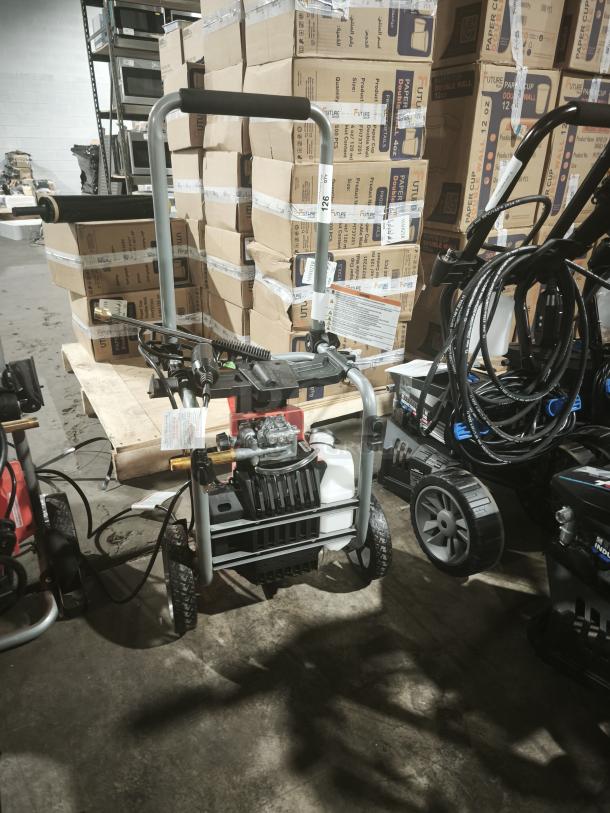 Husqvarna PW2300 Electric Pressure Washer, tested, working condition, features sturdy wheels and a durable frame.