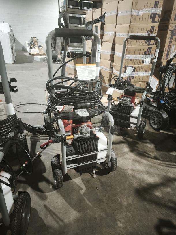 Husqvarna PW2300 Electric Pressure Washer, tested and working, sturdy frame, ergonomic handle, hose and attachment included.