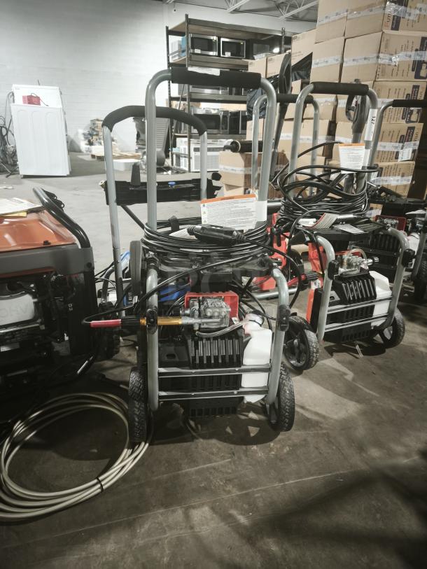 Husqvarna PW2300 electric pressure washer, tested and working, with coiled hose and robust frame, in good condition.