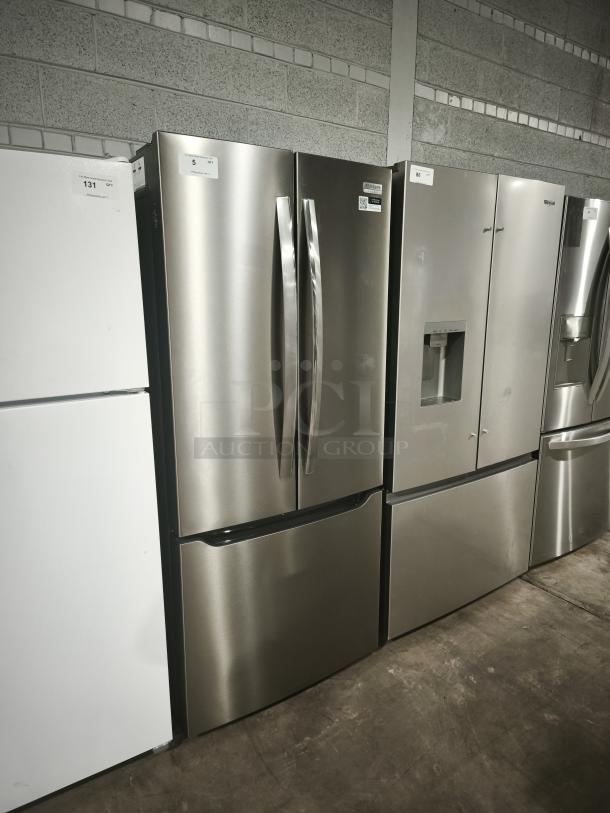 NEW Frigidaire Gallery 20 cu ft French Door Refrigerator, Model GRFN2023AF00, stainless steel finish, pristine condition.