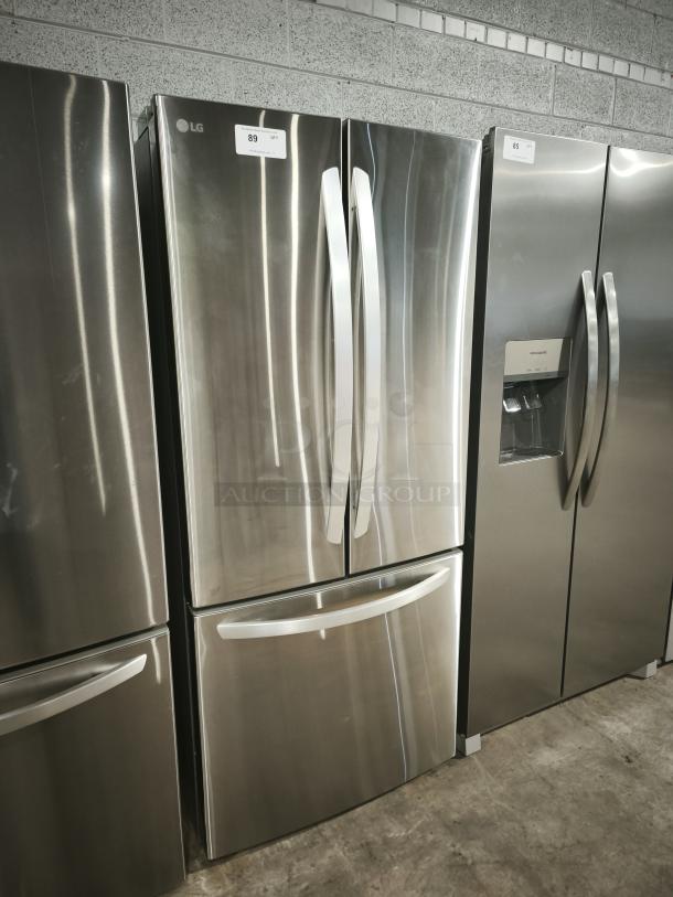 LIKE NEW LG 22 cu ft French Door Refrigerator, 30-inch width, model LFCS2250S/07, stainless steel, excellent condition.