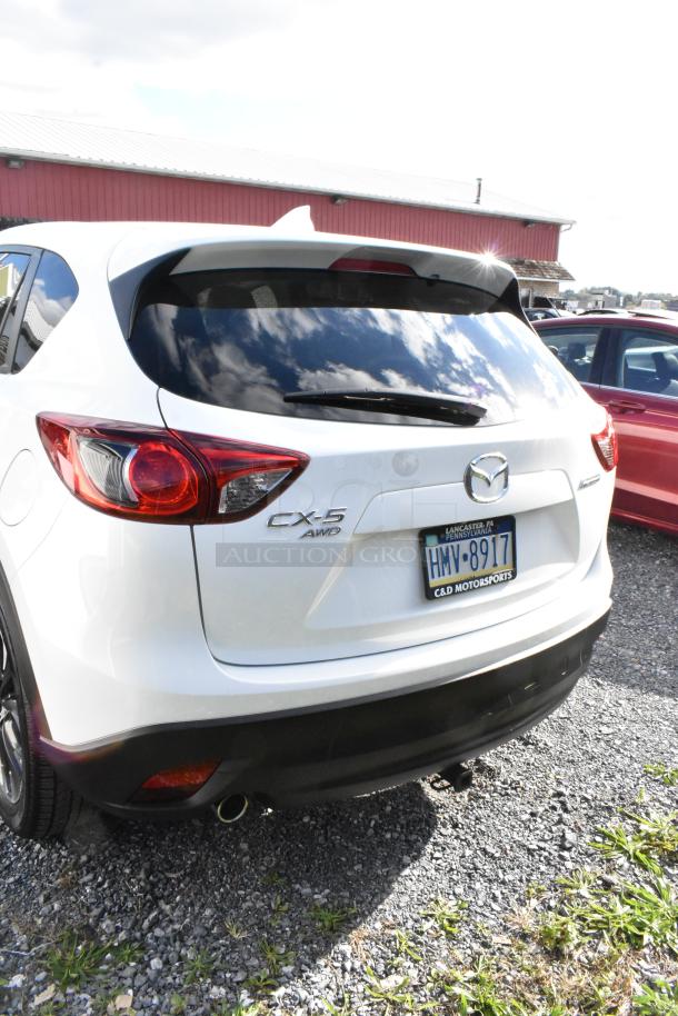2016 Mazda CX-5 Grand Touring 4WD in white, rear view, AWD badge, Pennsylvania plate, well-maintained condition.