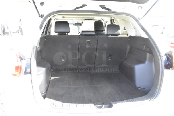 2016 Mazda CX-5 Grand Touring 4WD, white, spacious rear cargo area, clean interior, VIN JM3KE4DY0G0778964. Includes key.