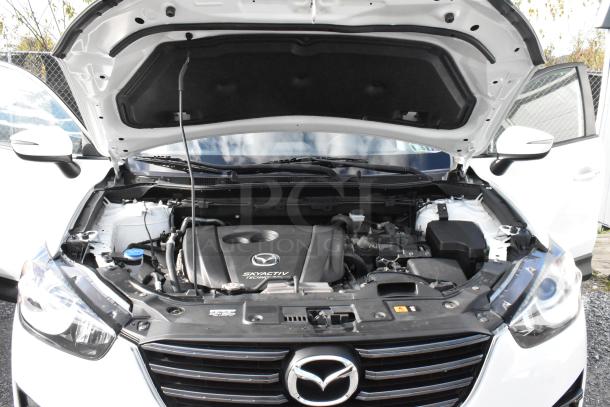 2016 Mazda CX-5 Grand Touring 4WD engine view, white exterior, includes key, VIN JM3KE4DY0G0778964. Great condition.