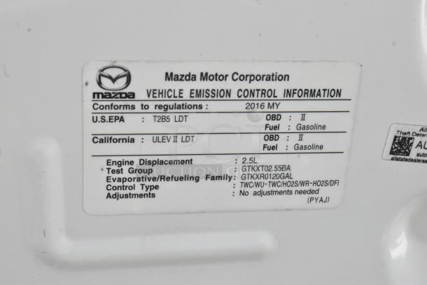 2016 Mazda CX-5 Grand Touring 4WD SUV. U.S. EPA and California emission labels, 2.5L gasoline engine, VIN JM3KE4DY0G0778964.
