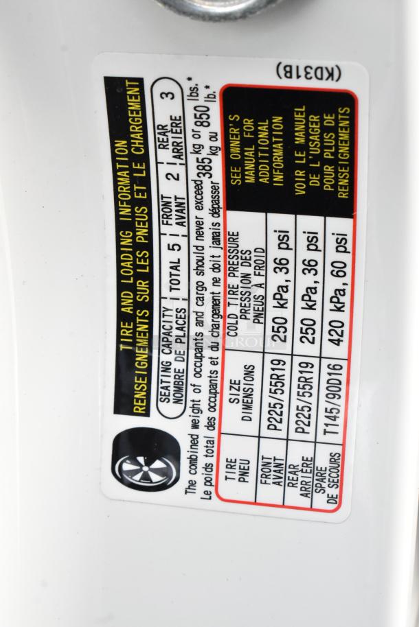 Tire and loading info label for 2016 Mazda CX-5 showing seating capacity, tire pressure, and size.