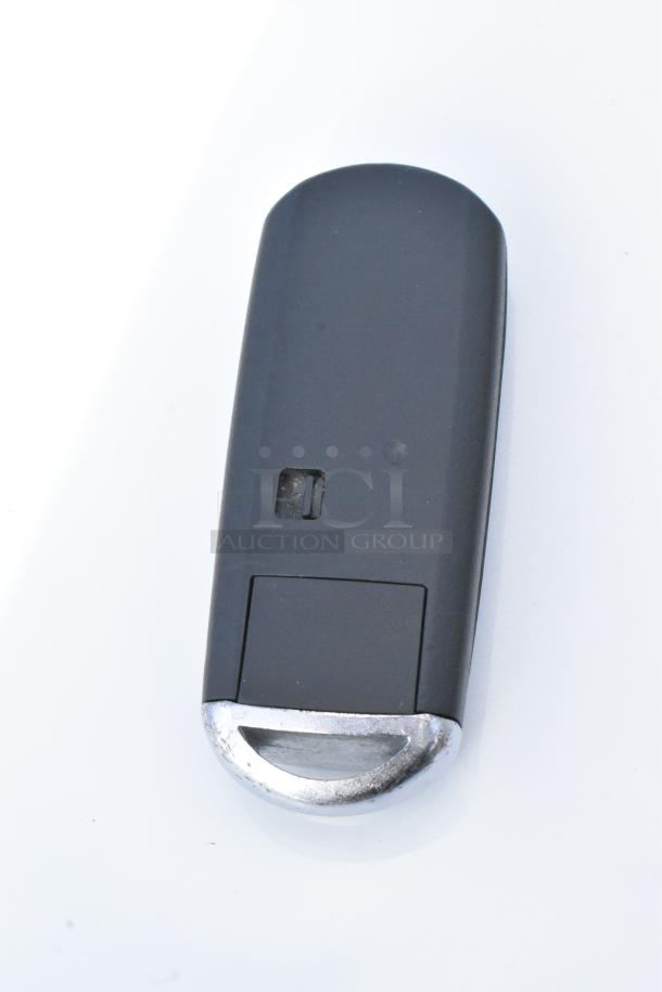 2016 Mazda CX-5 Grand Touring key fob, black with silver trim, for 4WD SUV.