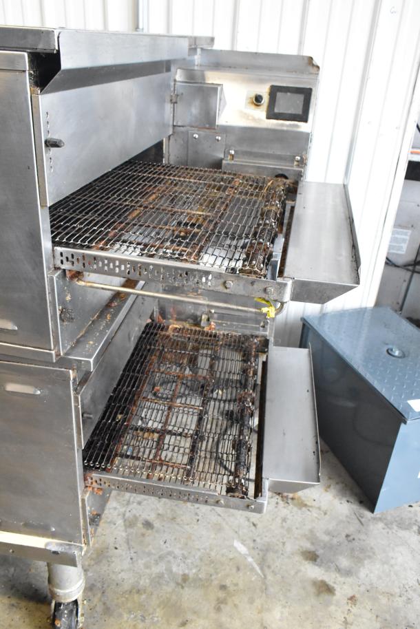 2021 Middleby Marshall PS638G stainless steel conveyor pizza ovens on casters, natural gas, 89,000 BTU, moderate wear.