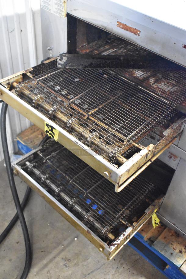 Middleby Marshall CTX DZ33I stainless steel commercial conveyor pizza ovens, used condition, on casters, 208V, 3/1 Phase.