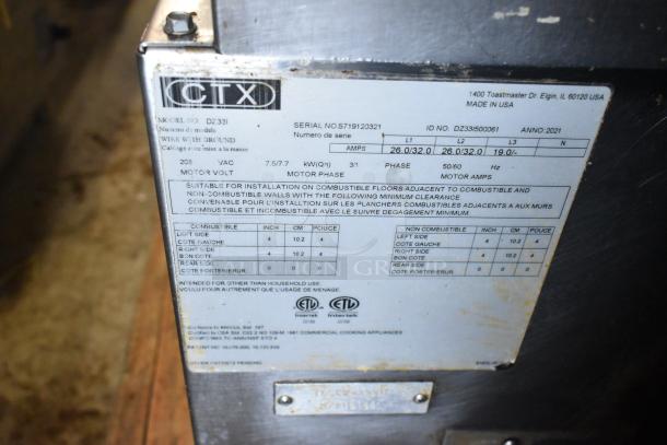 Middleby Marshall CTX DZ33I stainless steel conveyor pizza oven label showing model, voltage, and installation details.