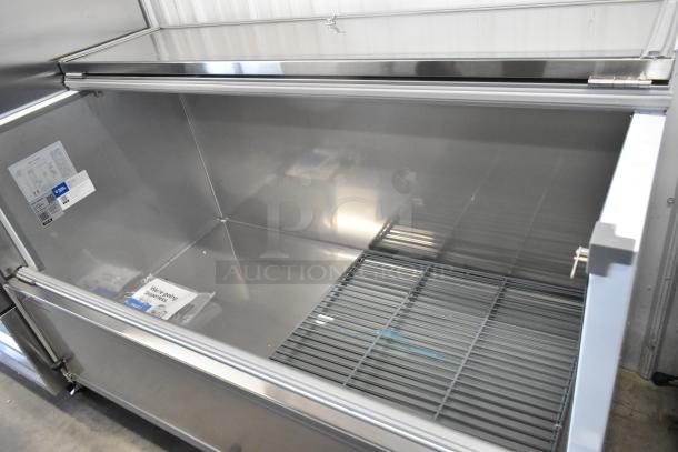 Avantco 178MC58HC stainless steel 58" milk cooler, brand new, slight scratches. Includes commercial casters, 115V, 1 phase.