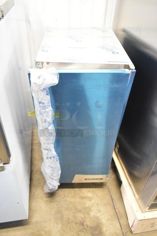 Brand new Hoshizaki AM-50BAK stainless steel commercial ice machine, undercounter model with 27 lb. bin, visible packaging.