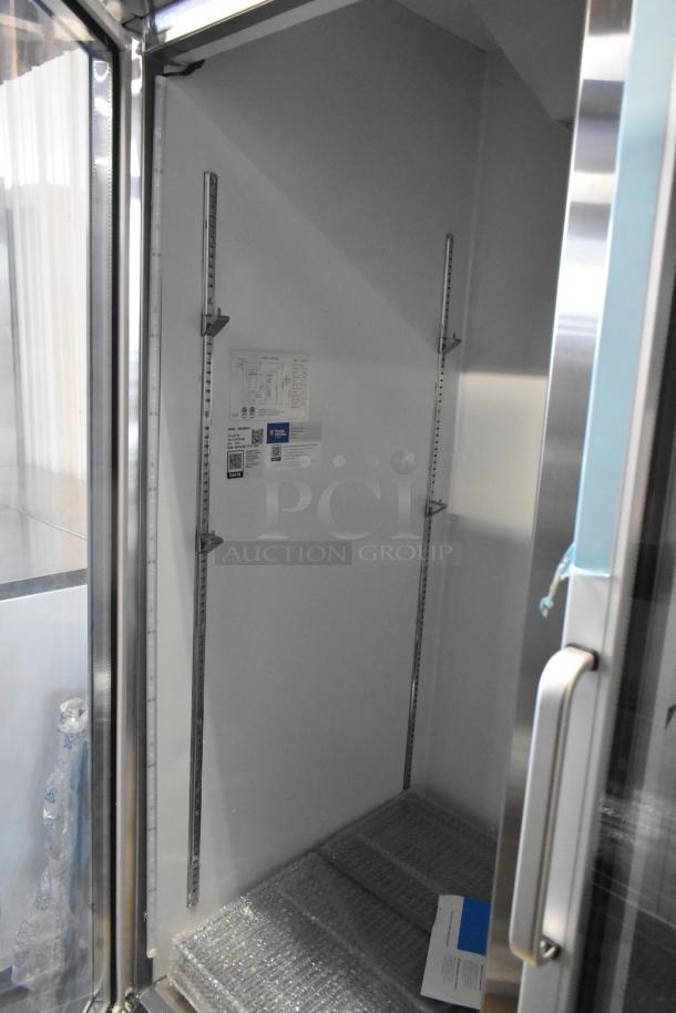 Brand new Avantco 178A49RGHC stainless steel commercial 2-door reach-in cooler, featuring poly-coated racks.