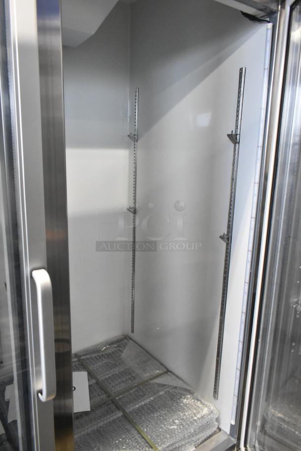 Brand new 2025 Avantco stainless steel 2-door reach-in cooler, model 178A49RGHC, with poly coated racks. Scratch and dent.