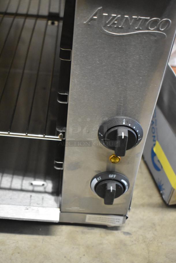 Brand new 2024 Avantco 177CHSME32IM stainless steel electric countertop cheese melter; features control dials.
