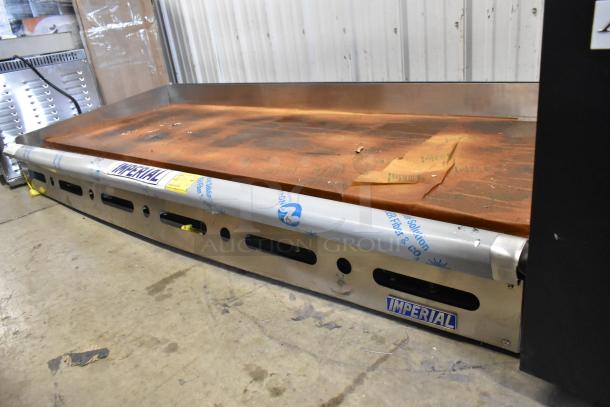 Brand new Imperial ITG-72 stainless steel countertop natural gas griddle, some scratches, protective wrap partially removed.