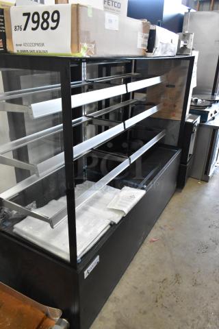 Brand new Avantco 193BCFD72B bakery display case, black, LED lighting, 115V, 1 phase. Note broken glass, as pictured.
