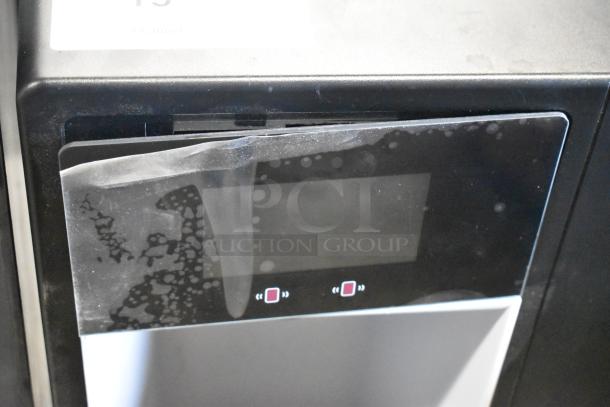 2024 Follett 7UD112A-IW-NF-ST-00 stainless steel ice maker with visible protective film and control panel. 7 lb. bin, new condition.