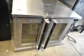Brand new Cooking Performance Group CPG 351FEC100C stainless steel single deck electric convection oven with view-through doors.