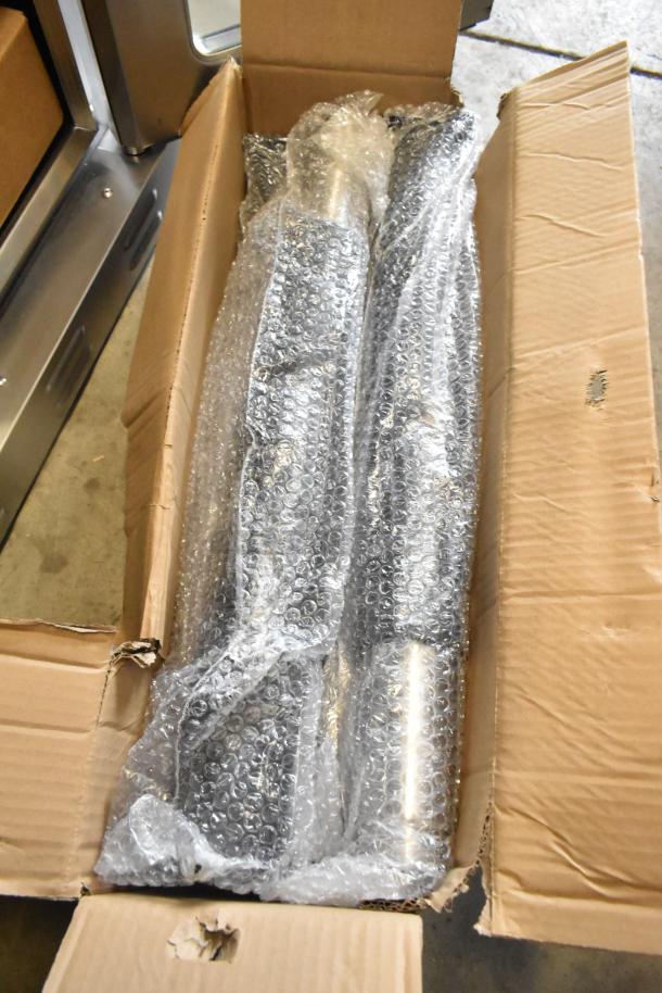 Cardboard box with bubble-wrapped components for Cooking Performance Group model 351FEC100C commercial oven.
