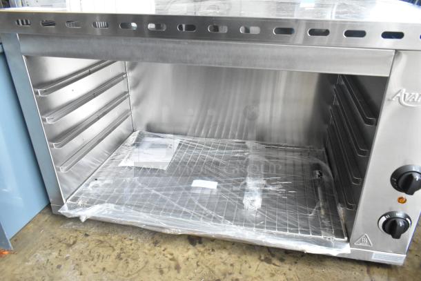 Brand new Avantco 177CHSME32IM 32" stainless steel electric cheese melter, scratch and dent, 208/240V, 1 phase.