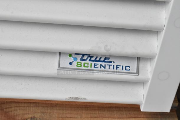 True TSCI-600R-G-PH metal single door cooler merchandiser. Brand new, scratch and dent. Features poly-coated racks.
