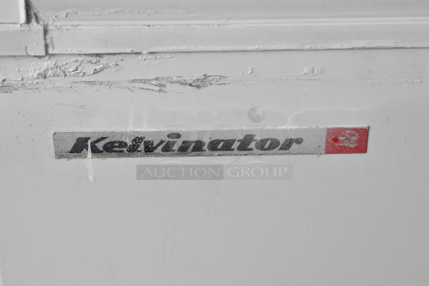 Kelvinator metal commercial ice cream dipping cabinet, visible wear, Kelvinator brand label, 115 volts, 1 phase.