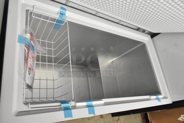 Danby DCF100A6WM chest freezer, 115 volts, 1 phase. Features metal interior and top basket. New with protective tape.